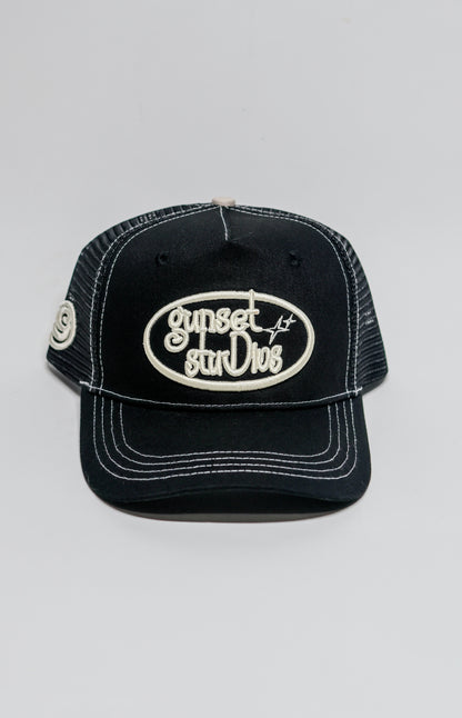BLACK WITH WHITE STITCHING TRUCKER HAT