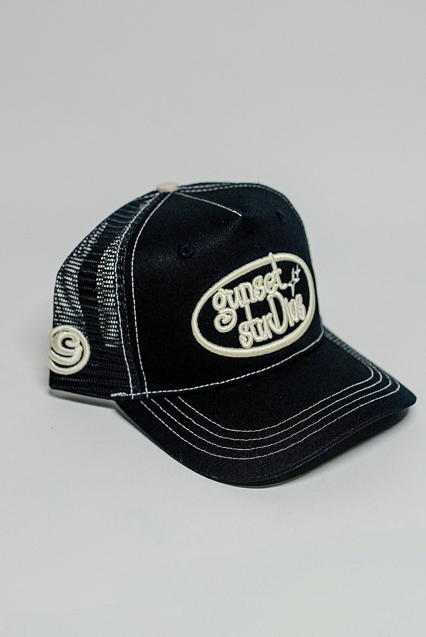 BLACK WITH WHITE STITCHING TRUCKER HAT
